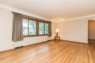 Wood floors in Living Room, Hall, and all 3 Bedroo