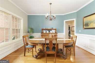 Formal Dining Room with hardwood floors and natural light