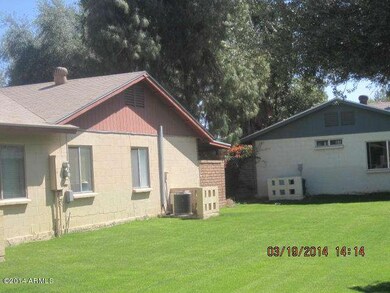 LOOKING AT BACK/WEST SIDE
