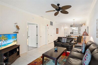 Living room with light tile patterned flooring, cr