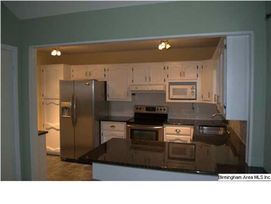 Updated kitchen with granite counter tops, stainle