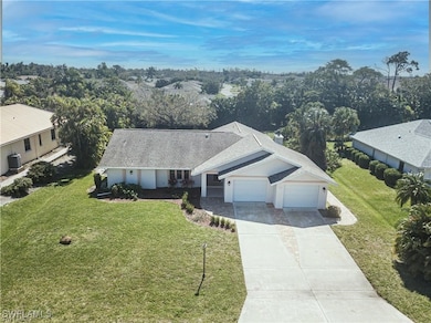 6113 Deer Run Front Elevation with wide driveway f