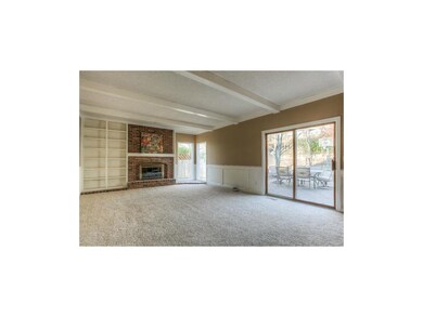 This is truly A GREAT ROOM with cozy brick firepla