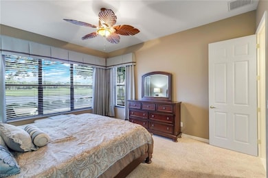 Furnished Master Bedroom with pool, golf and water