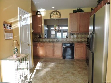 Kitchen view to dining room & family room