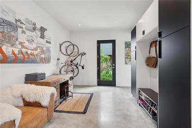 Contemporary hall tree with shoes storage, coat and shelves.