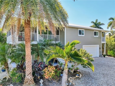 7704 Myrsine Cir unit 10, Bokeelia, FL 33922 - photo 3