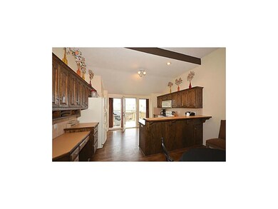 KITCHEN WITH LOTS OF STORAGE SPACE.