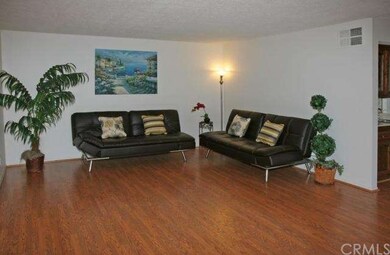 Large Living Room with Wood Laminate Flooring