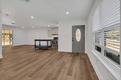 Foyer entrance featuring recessed lighting and light wood-type flooring