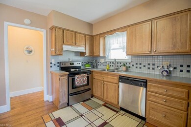 The kitchen comes with all appliances and has beautiful hardwood floors