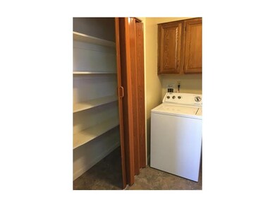 Laundry Room. Located just off the kitchen area
