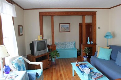 Unit 1: 1st floor living room.