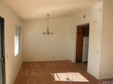 Dining area, new carpet, fresh paint