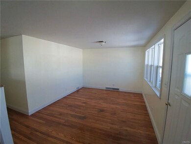 Living Room with refinished hardwoods and new LED 