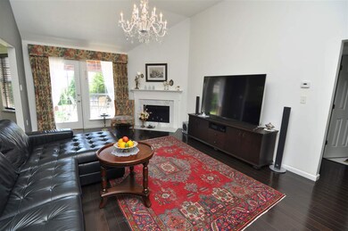 A cozy gas log fireplace highlights the family-siz