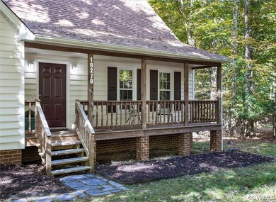 Property entrance with a porch