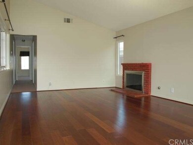 Beautiful Merbau Wood Floors and Vaulted Ceilings