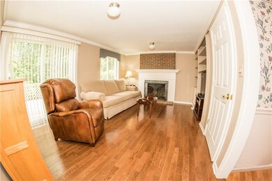 Family room with built-in bookshelves and beautifu