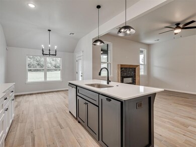 Kitchen with light hardwood / wood-style floors, s