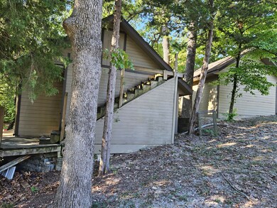 Side view of garages and apt