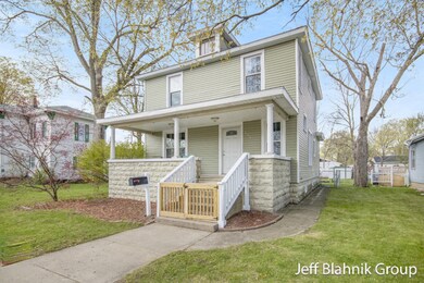 212 N Hudson St SE, Lowell, MI 49331 - photo 2