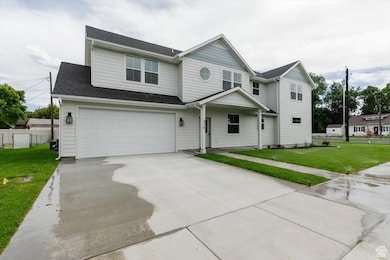 View of front of property with concrete driveway, an attached garage, roof with shingles, and a porch