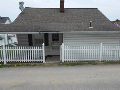 Covered back porch along Hillside Way.