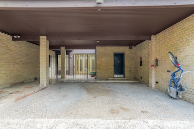 This property offers the convenience of a spacious two-car attached carport, providing easy access and sheltered parking.