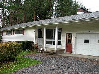 Exterior Front. New stone added to driveway.  Atta