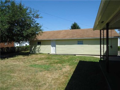 Parking Lot/Garage. OVER SIZED GARAGE W/WORKSHOP