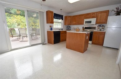 Eat in Kitchen with Slider Doors to Rear Deck