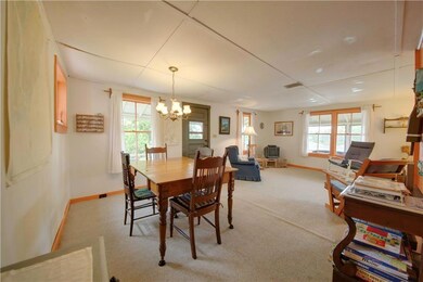 Living room and dining area facing...