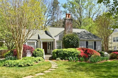 Front exterior with some of the azaleas in bloom.