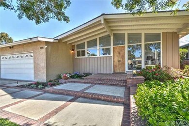A wall of windows add to the curb appeal.