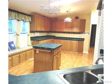 Kitchen Huge eat in kitchen with abundant storage 
