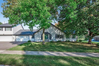 Lovely front exterior with new roof, gutters, downspouts & windows!