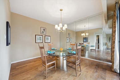 Dining room accesses balcony.  Will seat up to 10 and has room for serving pieces.