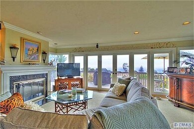 Living Room with Cozy Fireplace and View