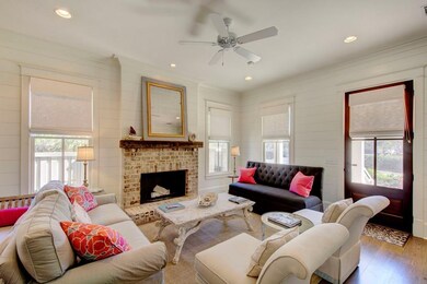 Fireplace has a reclaimed mantle and gas starter -