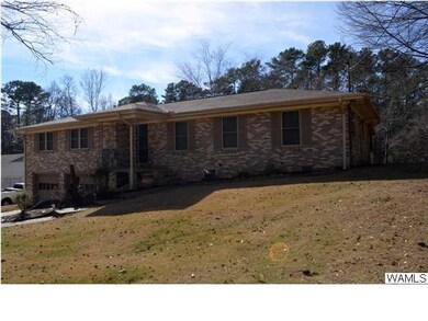 All brick home is ready for new owners!    Sits on
