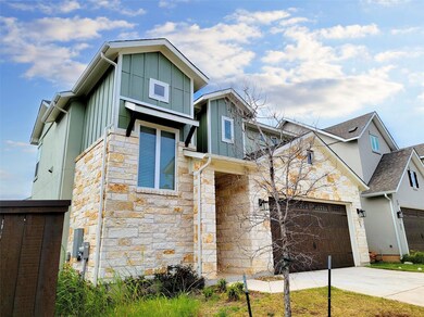 Modern home with stone siding, board and batten s