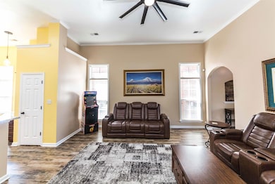 Living area featuring a wealth of natural light, v