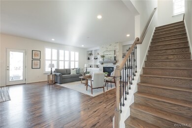 Living room with dark hardwood / wood-style floori