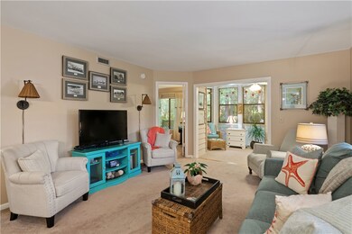 Bright living room with lots of windows.