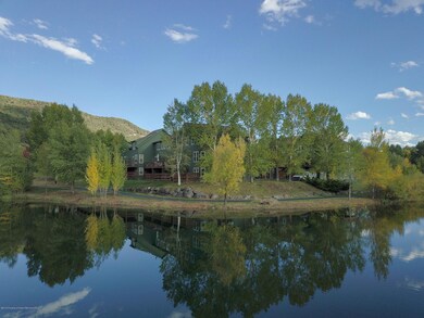 surrounded by water & green space