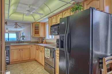Open kitchen with views of ocean