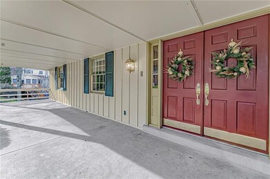 FRONT PORCH: This expansive front porch with stunn