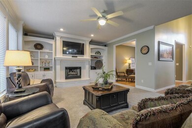 BEAUTIFUL, WHITE BUILT-INS BY FIREPLACE