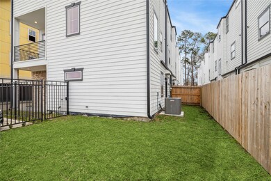 Backyard of a modern home with a well-maintained g